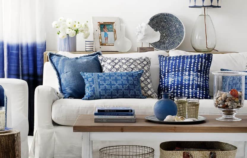 Coastal living room in San Diego blue pillows