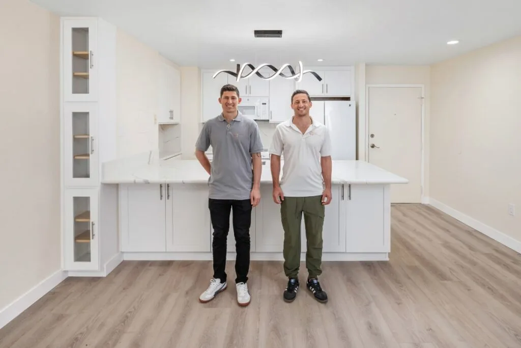 Kitchen Remodel in la Jola - San Diego, by Sheiner Construction - Sheiner Brothers Didi and Joseph in front of the new kitchen