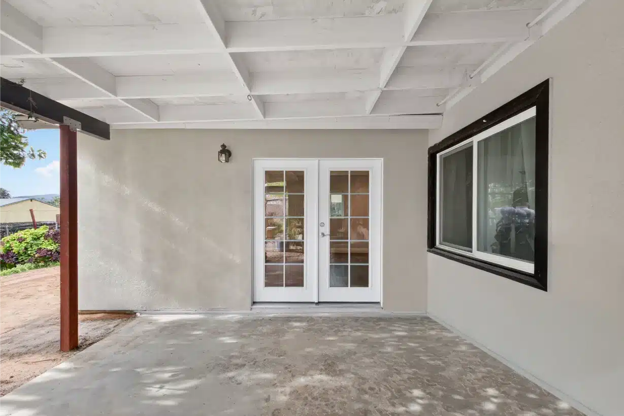 The same covered room looking out toward the yard