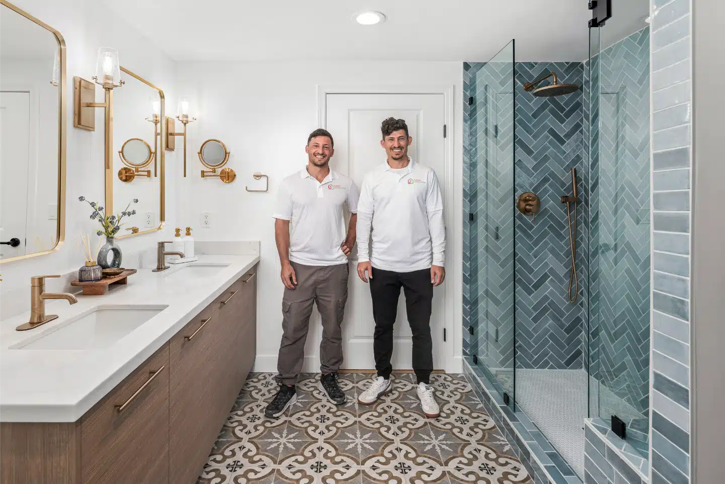 Joseph and Didi Sheiner in the completed primary bathroom of the Little Italy condo