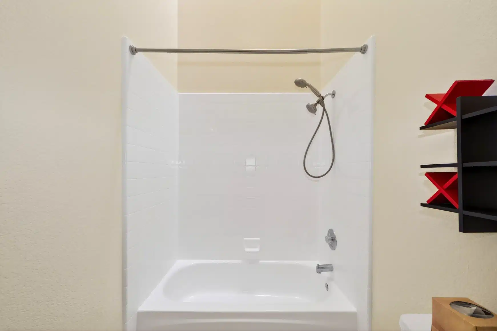 Second bathroom with a tub-shower and handheld set