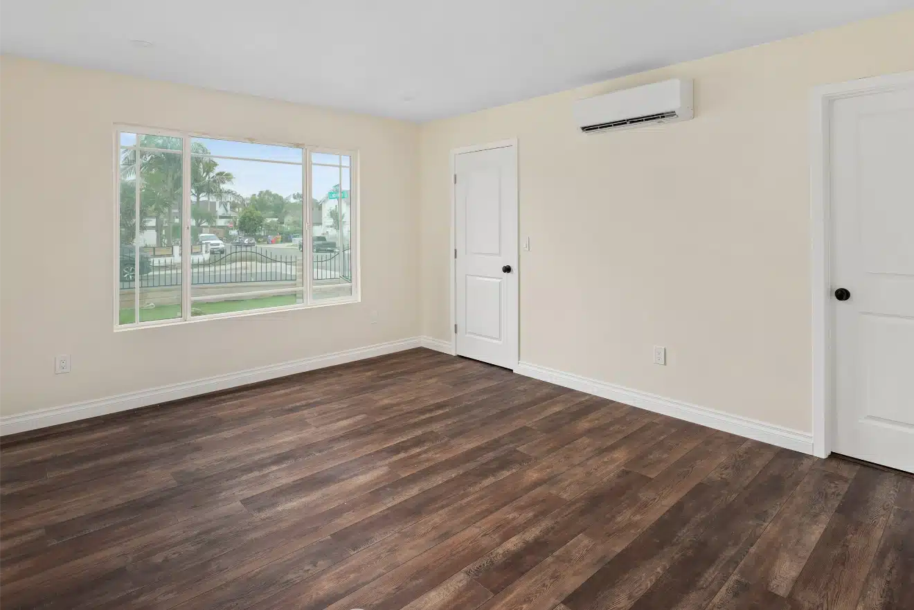 The new room empty, showing the window and door positions