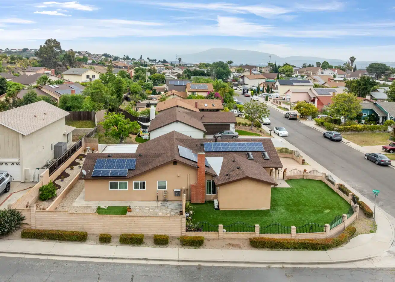 Aerial view of the completed property with the new roof across the whole house