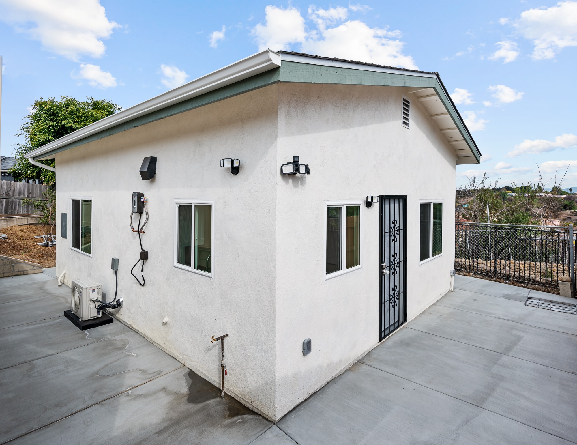 Completed 498 square foot detached ADU in San Diego, finished in white stucco