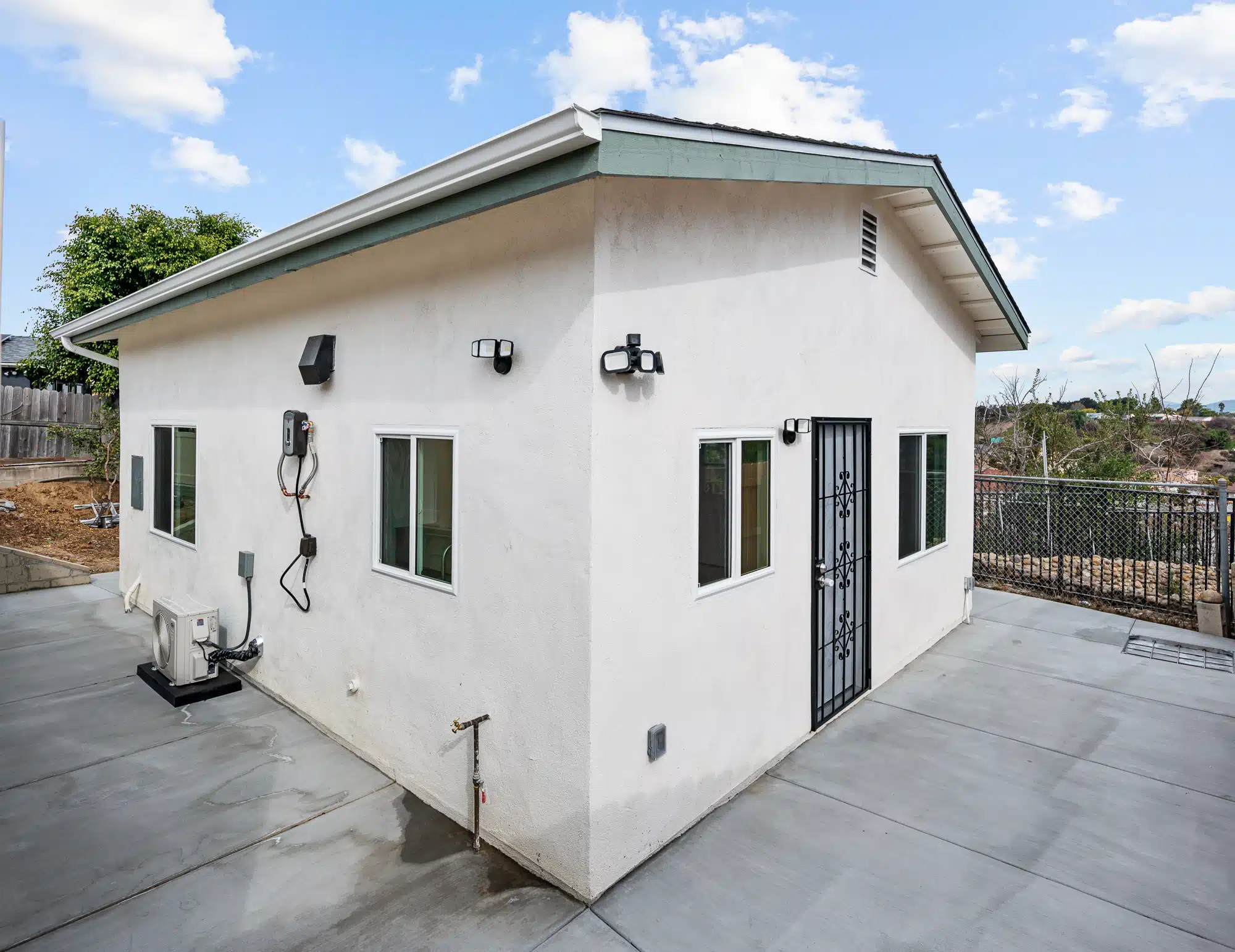 Completed 498 square foot detached ADU in San Diego, finished in white stucco