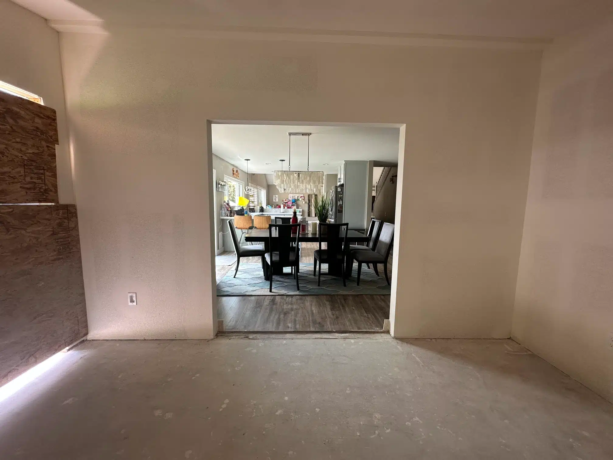 Completed home office addition in San Diego, looking through the new opening to the dining room