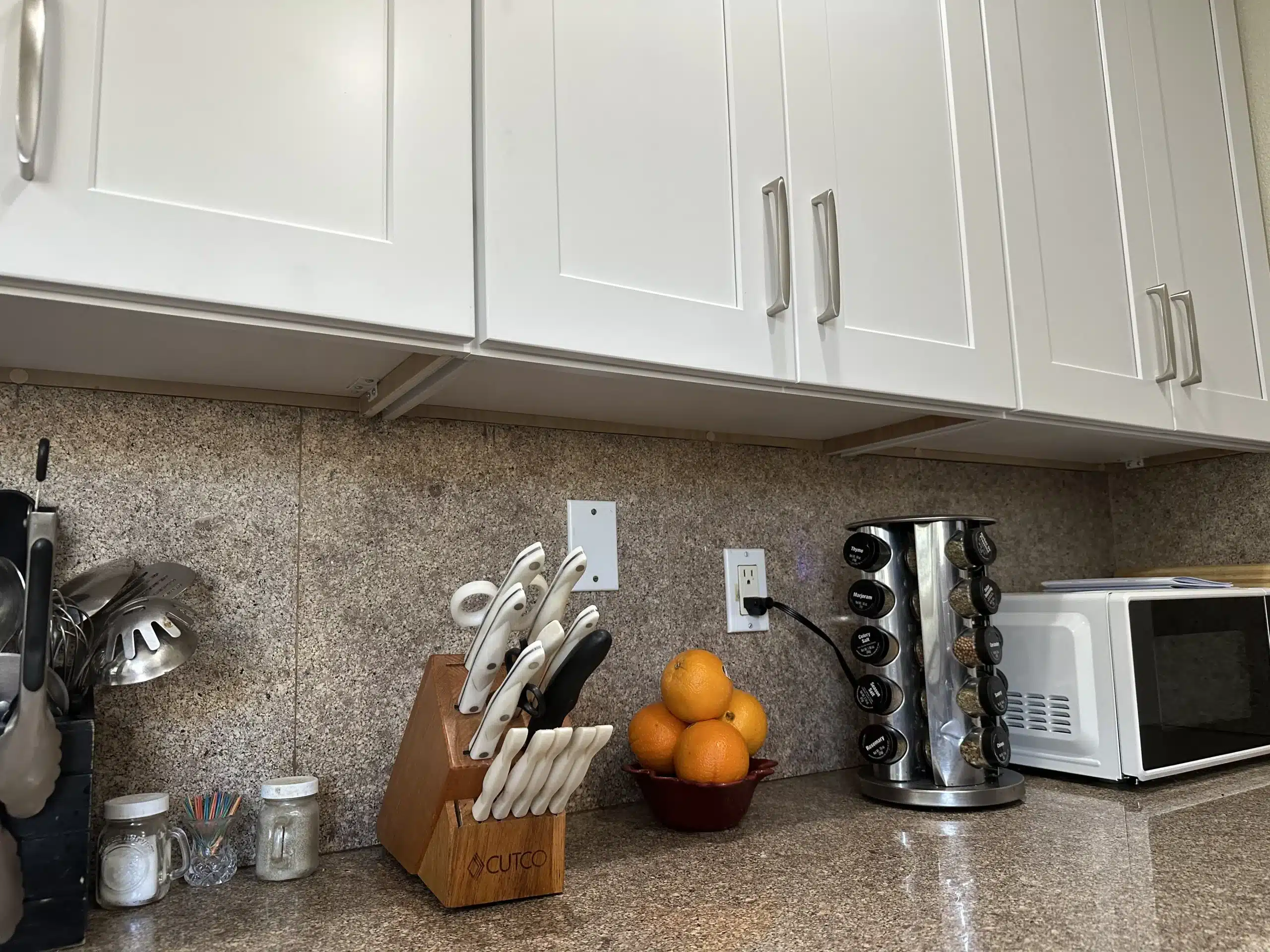 Counter and tile backsplash detail in the completed San Diego galley kitchen