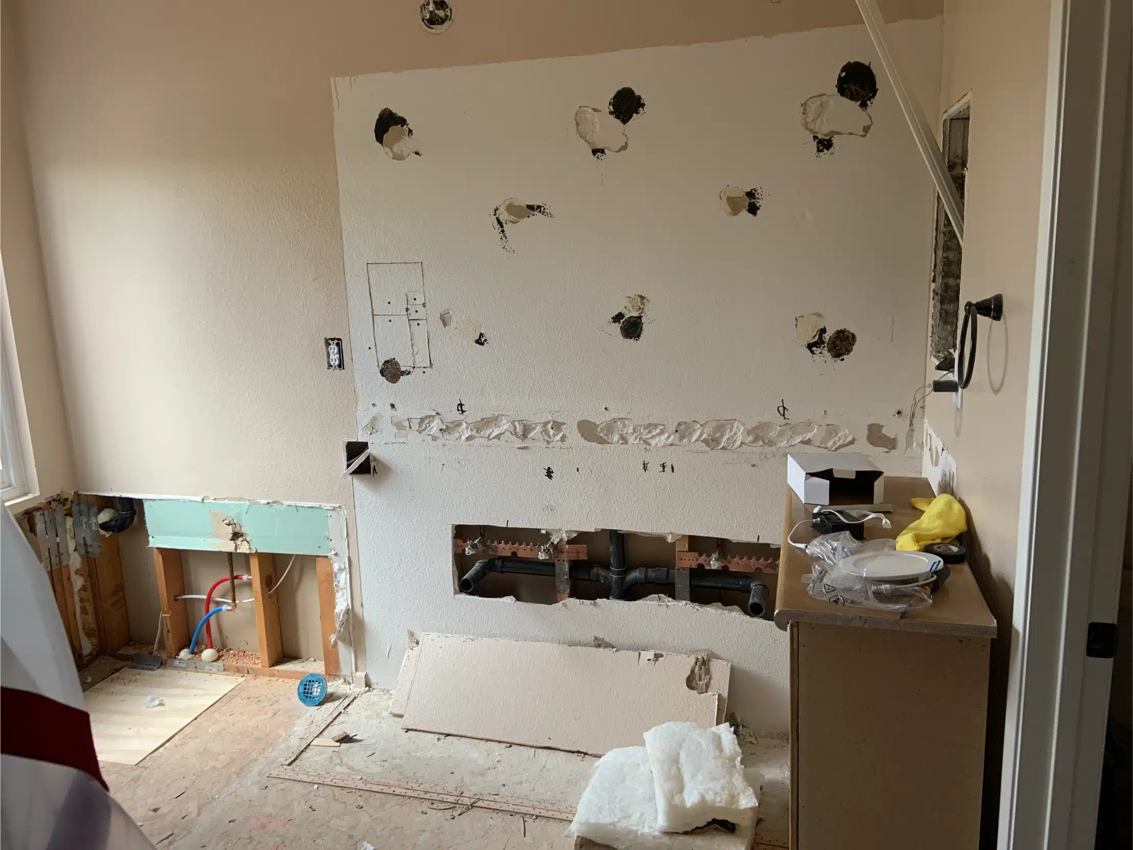 The stripped bathroom marked out for the new layout before rebuilding