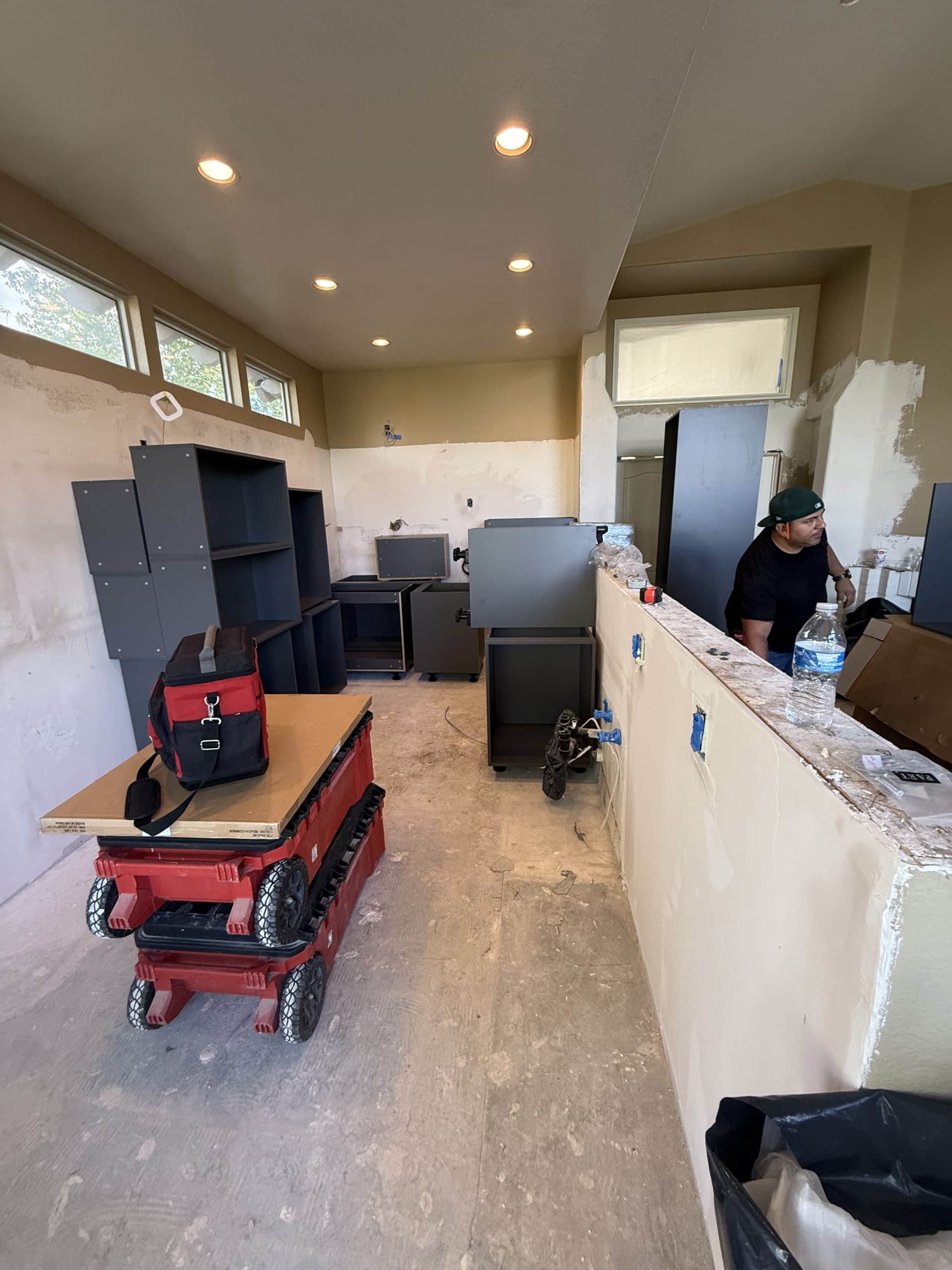 New cabinetry arriving as the kitchen is set out