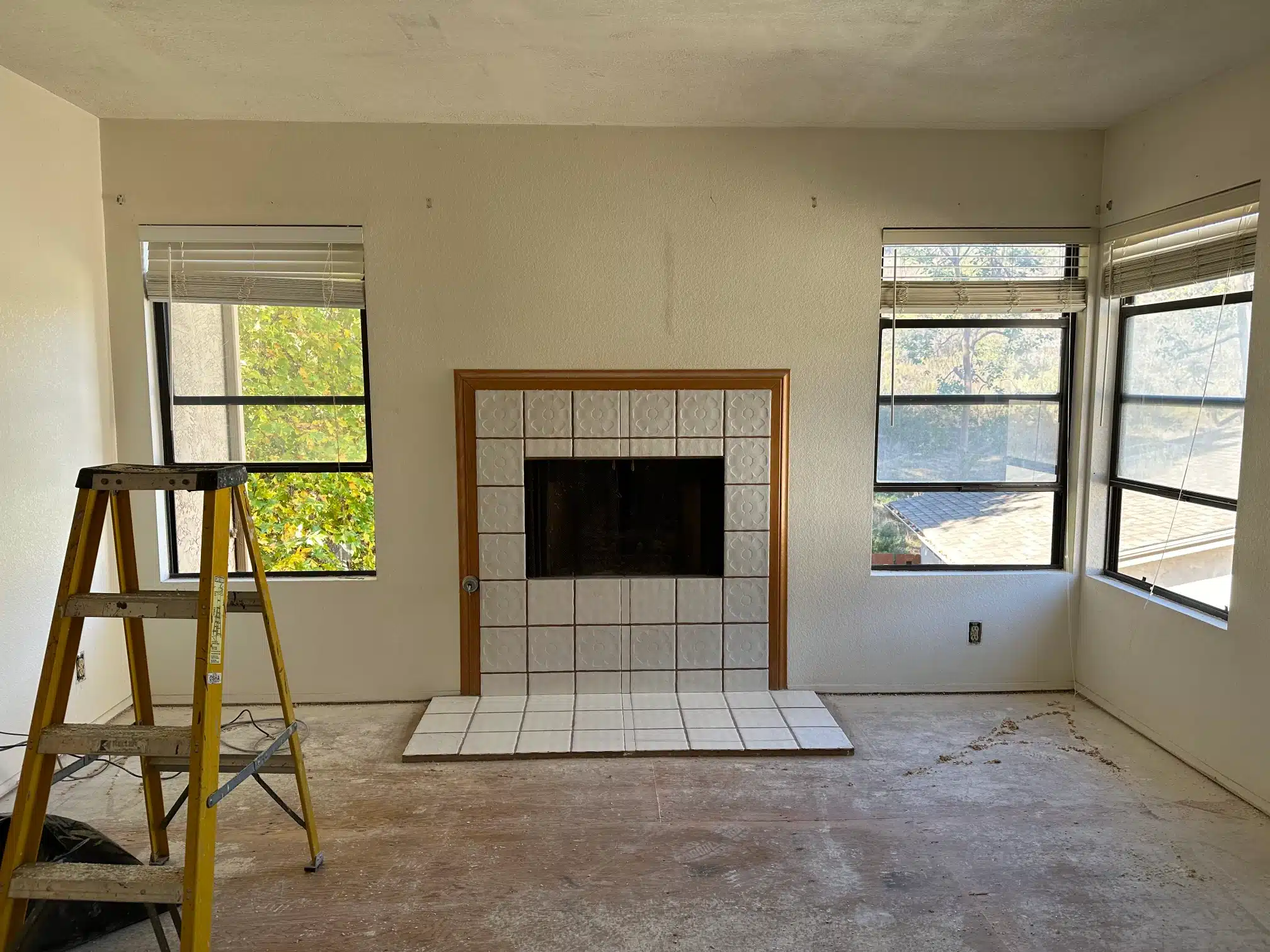 The original tiled fireplace surround before it was rebuilt