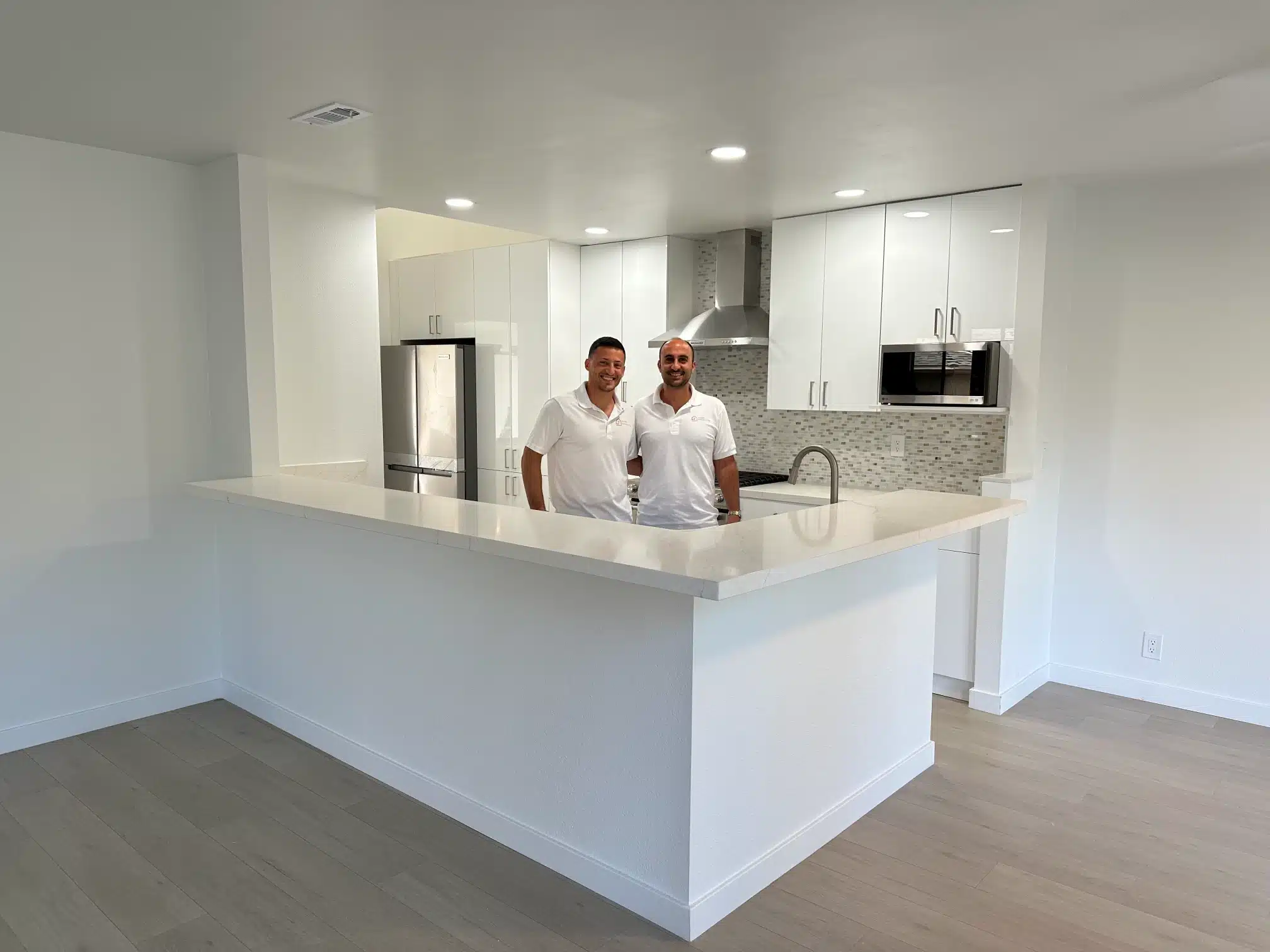 The finished kitchen peninsula open to the living space