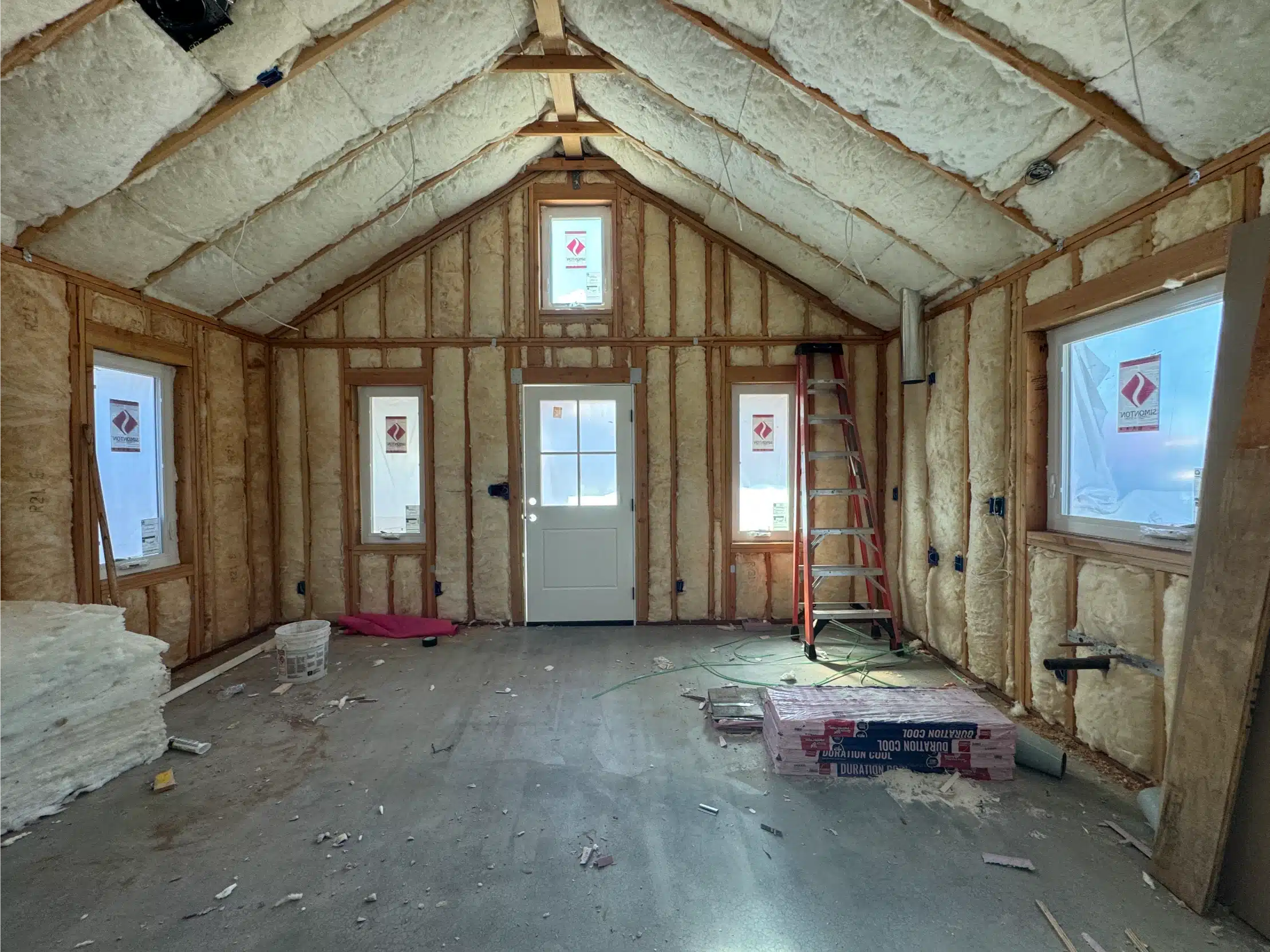 Spray foam insulation applied throughout the ADU interior