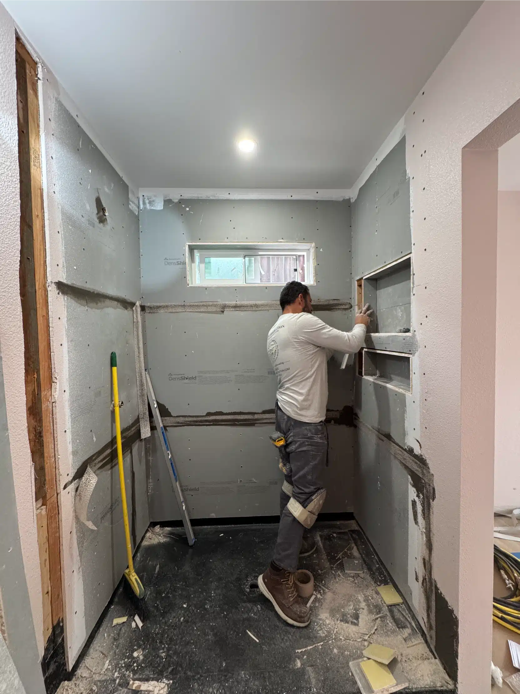 Finishing work underway inside the ADU with cabinetry going in