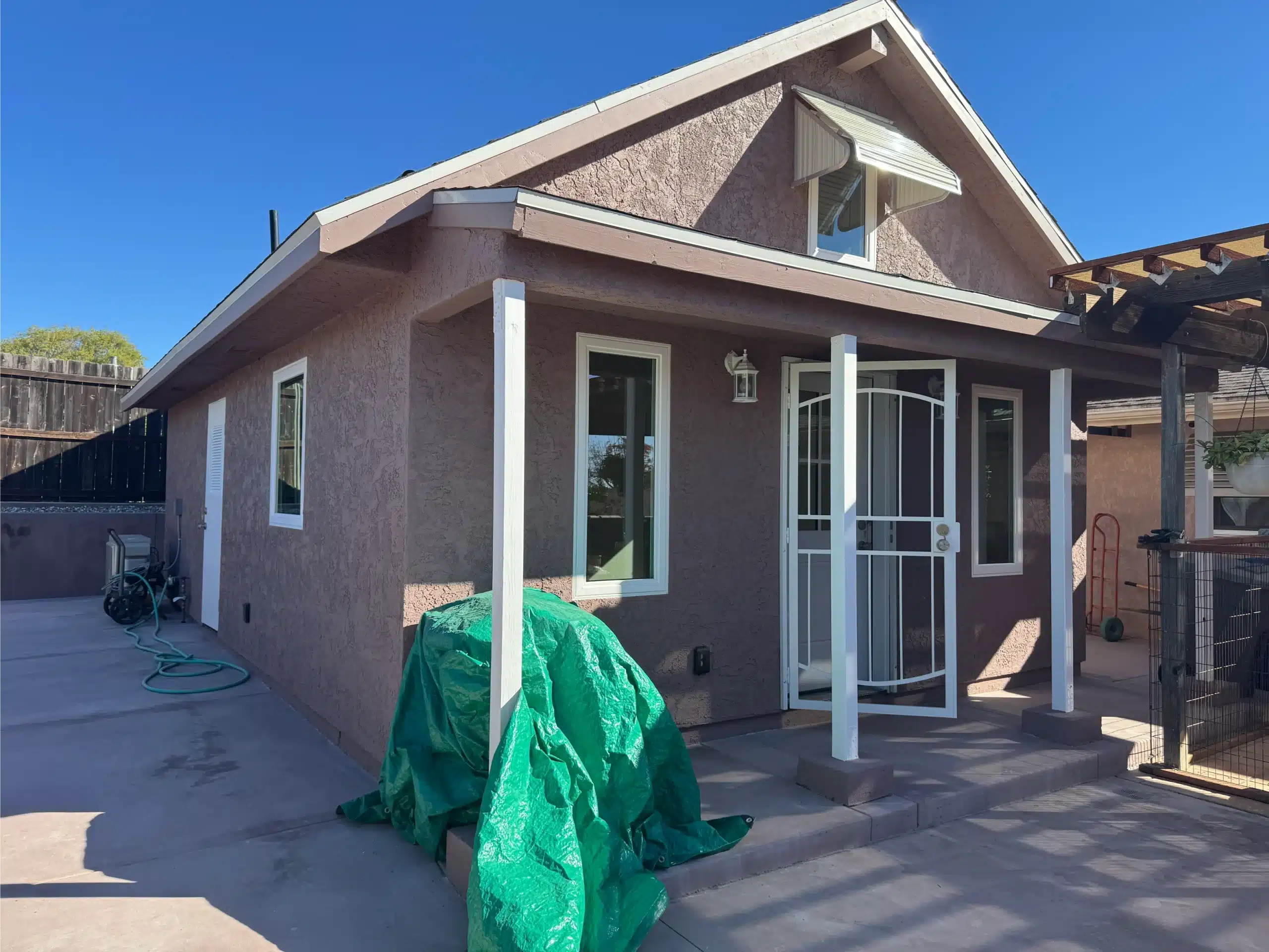Completed detached ADU in La Mesa, finished in stucco with a covered entry