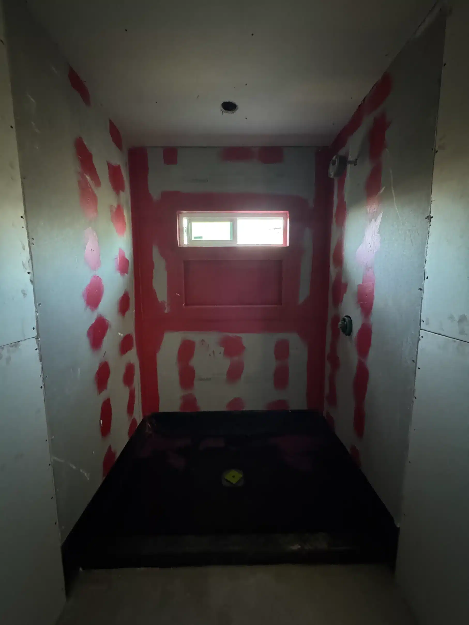 Masked doorway and protected floor during the finishing stage